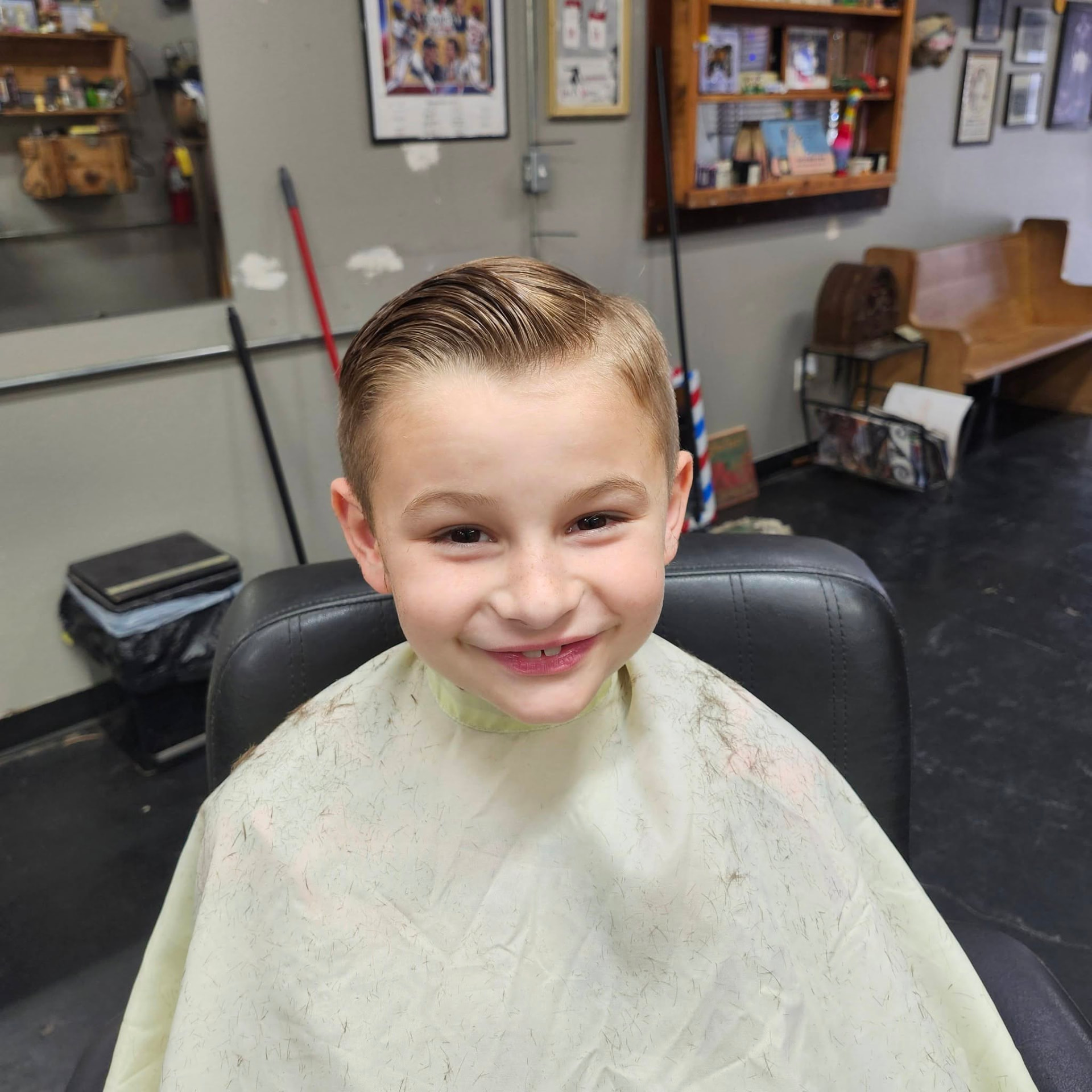 Young boy with a fresh side part haircut
